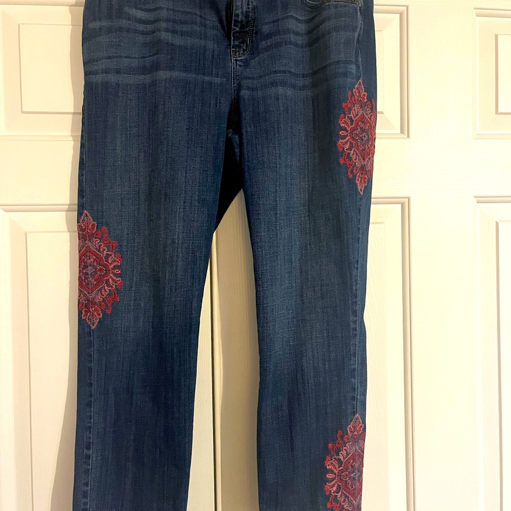 Chicos embellished so slimming girlfriend jeans.  Chico size 2